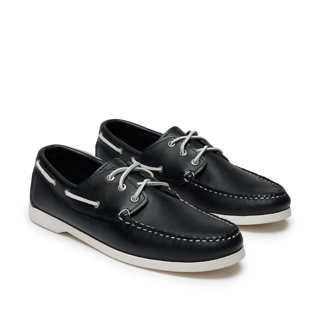Men’s Quoddy Head Boat Shoes in Navy, front view, moccasin construction leather, boat sole, perimeter lacing, unlined, Quoddy