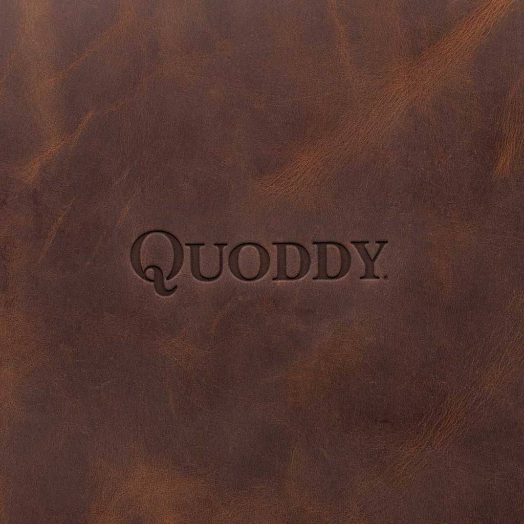 Quoddy-Logo-Leather-Embossed.jpg