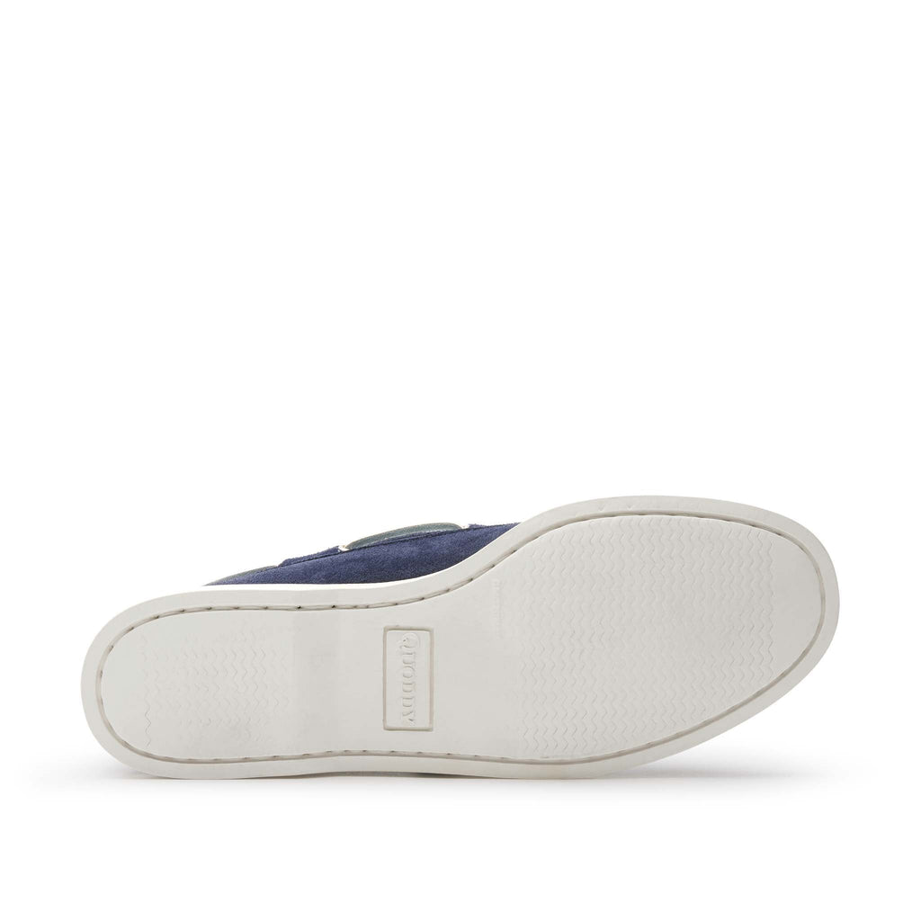 Women’s Auburn Boat Shoe in Navy, sole view, premium suede, siped boat sole, full perimeter lacing, soft Napa lining, Quoddy