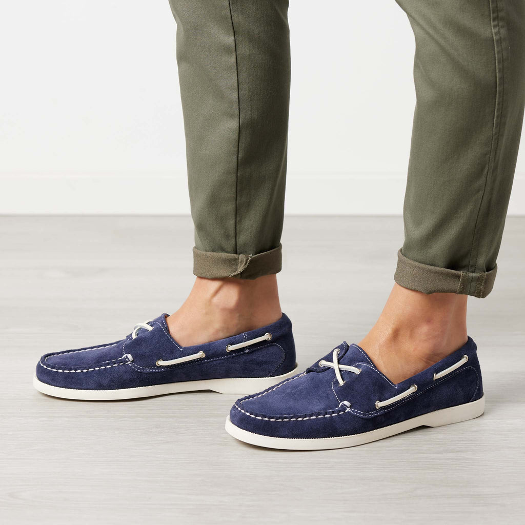 Women’s Auburn Boat Shoes in Navy, on woman, premium suede, boat sole, full perimeter lacing, soft Napa leather lining, Quoddy