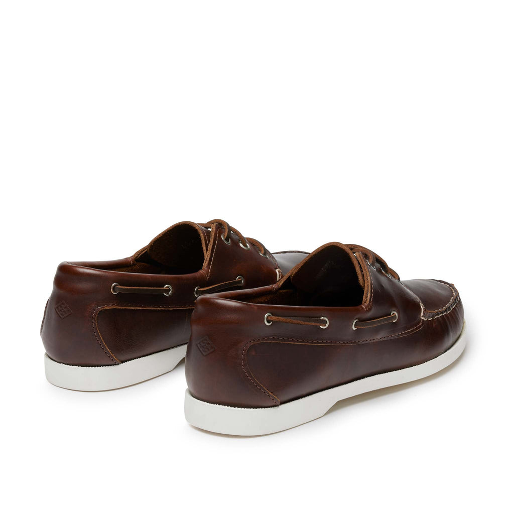 Men’s Quoddy Head Boat Shoes in Brown, rear view, moccasin construction leather, boat sole, perimeter lacing, unlined, Quoddy